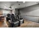 Enjoy a movie in the in-home theatre featuring leather recliners, a large screen, and blackout shades at 5309 E Hearn Rd, Scottsdale, AZ 85254