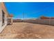 The property boasts a large, enclosed backyard, offering privacy and ample room for landscaping at 5499 E Red Bird Ln, San Tan Valley, AZ 85140