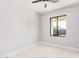 An empty bedroom features marble floors, white walls, and a window that offers natural light and exterior views at 5499 E Red Bird Ln, San Tan Valley, AZ 85140