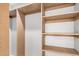 Walk-in closet with extensive shelving and ample space for clothes and accessories at 5499 E Red Bird Ln, San Tan Valley, AZ 85140