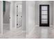 Bright hallway with marble floors and a view of interior doors enhancing the home's modern appeal at 5499 E Red Bird Ln, San Tan Valley, AZ 85140