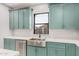 Stylish kitchen featuring stainless steel appliances, custom cabinetry, and sleek countertops, perfect for culinary enthusiasts at 5499 E Red Bird Ln, San Tan Valley, AZ 85140