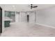 Spacious living room featuring tile floors and a view of the kitchen, perfect for entertaining and Gathering time at 5499 E Red Bird Ln, San Tan Valley, AZ 85140