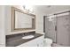 This bathroom features a single sink vanity with black granite countertop and a glass-enclosed shower at 7120 N Via De La Sendero --, Scottsdale, AZ 85258