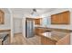 Efficient kitchen layout, highlighted by the granite countertops and stainless steel appliances at 7120 N Via De La Sendero --, Scottsdale, AZ 85258