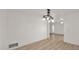 Bright living room with new floors and modern lighting at 7120 N Via De La Sendero --, Scottsdale, AZ 85258