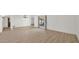 Spacious living area with ample natural light and stylish wood-look flooring at 7120 N Via De La Sendero --, Scottsdale, AZ 85258
