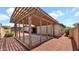 Covered patio with wooden pergola with desert landscaping in the background at 7120 N Via De La Sendero --, Scottsdale, AZ 85258