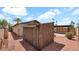 Exterior backyard shed next to the home and patio area with desert landscaping at 7120 N Via De La Sendero --, Scottsdale, AZ 85258
