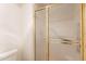 Bathroom featuring a shower with framed sliding doors at 8171 E Del Caverna Dr, Scottsdale, AZ 85258