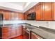 Well-equipped kitchen with stainless steel appliances and plenty of counter space at 8171 E Del Caverna Dr, Scottsdale, AZ 85258
