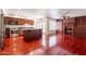 Spacious kitchen featuring stainless steel appliances, a large island, and cherry wood cabinets at 8171 E Del Caverna Dr, Scottsdale, AZ 85258