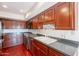 Well-equipped kitchen with stainless steel appliances and plenty of counter space at 8171 E Del Caverna Dr, Scottsdale, AZ 85258