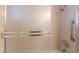 Shower features tiled walls, sleek fixtures, and a glass door enclosure at 8171 E Del Caverna Dr, Scottsdale, AZ 85258