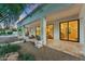 Expansive covered patio area with sliding glass doors, perfect for seamless indoor-outdoor living at 8196 E Sunnyside Dr, Scottsdale, AZ 85260