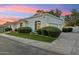 Tastefully landscaped front yard, enhancing the curb appeal of this charming single-level residence at 8196 E Sunnyside Dr, Scottsdale, AZ 85260