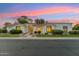 Charming single-story home with a well-manicured front yard and a welcoming entrance at 8196 E Sunnyside Dr, Scottsdale, AZ 85260