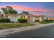 Charming single-level home with lush landscaping, offering a warm and inviting curb appeal at 8196 E Sunnyside Dr, Scottsdale, AZ 85260