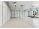 Spacious two car garage with epoxy floor, built in cabinets and two garage door openers at 8196 E Sunnyside Dr, Scottsdale, AZ 85260