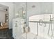 Modern bathroom featuring a large glass-enclosed shower and luxurious finishes at 8196 E Sunnyside Dr, Scottsdale, AZ 85260