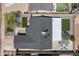 Aerial view of home showcasing roof, landscaping and surrounding neighborhood at 8732 E Arlington Rd, Scottsdale, AZ 85250