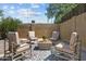 Charming courtyard featuring comfortable seating and a stylish rug, creating a relaxing outdoor space at 8732 E Arlington Rd, Scottsdale, AZ 85250