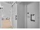 Practical laundry area with barn door and convenient hookups at 8732 E Arlington Rd, Scottsdale, AZ 85250