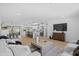 Spacious open concept living room and kitchen design with modern finishes at 8732 E Arlington Rd, Scottsdale, AZ 85250