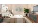Comfortable bedroom features a queen bed, wooden dresser, stylish decor, and natural lighting at 930 N Mesa Dr # 1023, Mesa, AZ 85201