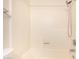 Clean, bright tiled shower and tub combo with grab bar and shower head at 930 N Mesa Dr # 1023, Mesa, AZ 85201