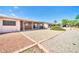 View of backyard with gravel and patios on a bright and sunny day at 9639 W Cinnabar Ave # A, Peoria, AZ 85345