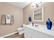 Clean bathroom with updated vanity, mirror, and modern fixtures at 9639 W Cinnabar Ave # A, Peoria, AZ 85345