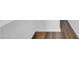 Staircase with wood-look flooring and white wall at 9639 W Cinnabar Ave # A, Peoria, AZ 85345