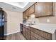 Well-lit kitchen features stainless steel appliances and lots of counter space at 9639 W Cinnabar Ave # A, Peoria, AZ 85345