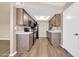 Traditional kitchen featuring wood cabinets, white countertops, and a skylight at 9639 W Cinnabar Ave # A, Peoria, AZ 85345