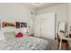Bright bedroom features neutral paint, carpet flooring, and closet at 10105 E Larkspur Dr, Scottsdale, AZ 85260