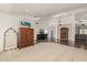 Open living space with hardwood floors, neutral tones, and abundant natural light, creating a bright and airy ambiance at 10105 E Larkspur Dr, Scottsdale, AZ 85260