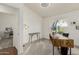 Home office boasts a unique window, neutral paint, and great natural light at 10105 E Larkspur Dr, Scottsdale, AZ 85260