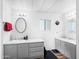 Bright bathroom featuring dual sinks, framed mirrors, and neutral decor for a clean, modern feel at 120 N Val Vista Dr # 178, Mesa, AZ 85213