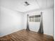 A bright bedroom with wood floors, ample natural light, and neutral decor creates a relaxing atmosphere at 120 N Val Vista Dr # 178, Mesa, AZ 85213