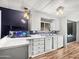 Bright kitchen with updated appliances, modern countertops, ample cabinet space, and stylish lighting fixtures at 120 N Val Vista Dr # 178, Mesa, AZ 85213