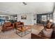 Cozy living room with plush leather seating, modern decor, and an open floor plan perfect for entertaining and relaxation at 120 N Val Vista Dr # 178, Mesa, AZ 85213