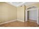 Bedroom with wood floors and an archway that leads to another room at 12183 E Mercer Ln, Scottsdale, AZ 85259