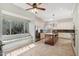 Bright, spacious kitchen with large windows, stainless steel appliances, and a central island at 12183 E Mercer Ln, Scottsdale, AZ 85259