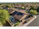 Aerial view of home with a pool and solar panels at 13361 N 99Th Pl, Scottsdale, AZ 85260