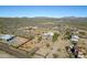 Stunning aerial view of desert home with gated entrance and mature landscaping at 13648 E Aloe Vera Dr, Scottsdale, AZ 85262