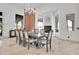 Spacious dining area with stylish decor, comfortable seating, and a fireplace at 13648 E Aloe Vera Dr, Scottsdale, AZ 85262