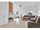 Open-concept living room with leather sofas, and decor accents at 13648 E Aloe Vera Dr, Scottsdale, AZ 85262
