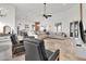 Spacious living room with high ceilings, tile floors, modern furniture, and plenty of natural light at 13648 E Aloe Vera Dr, Scottsdale, AZ 85262
