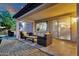 Back patio with a comfy lounge area featuring a plush sofa and chairs at 16105 N 183Rd Dr, Surprise, AZ 85388